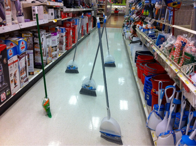 brooms in a store